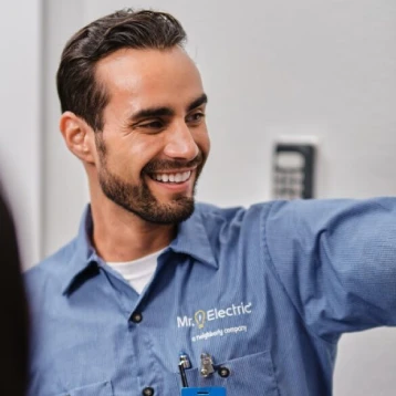 MRE smiling technician.