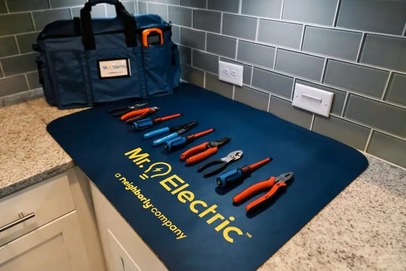 A Mr. Electric electrician's tools laid out on a counter in Savannah, GA.