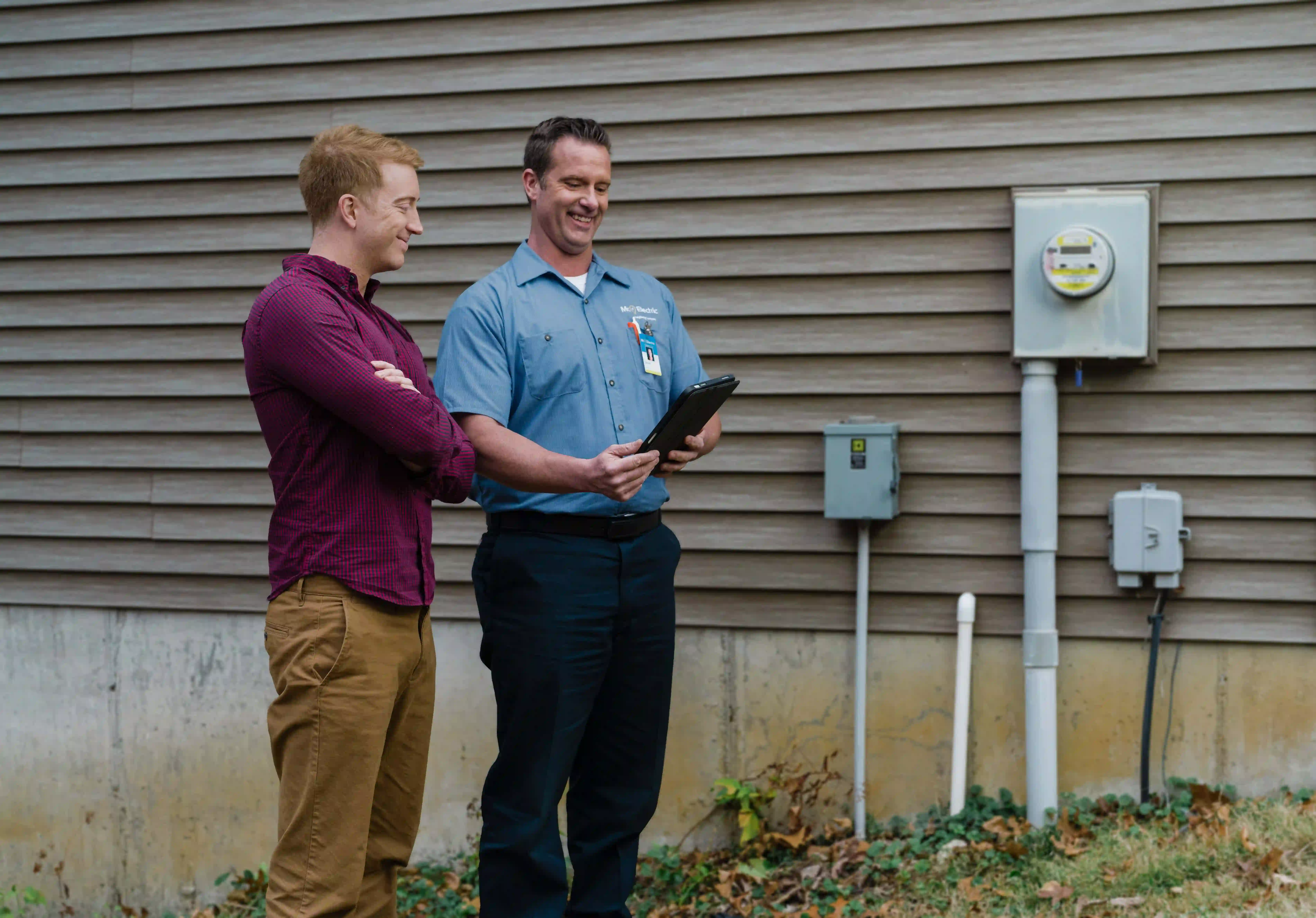 Mr. Electric of Wichita electrician discussing a generator installation.