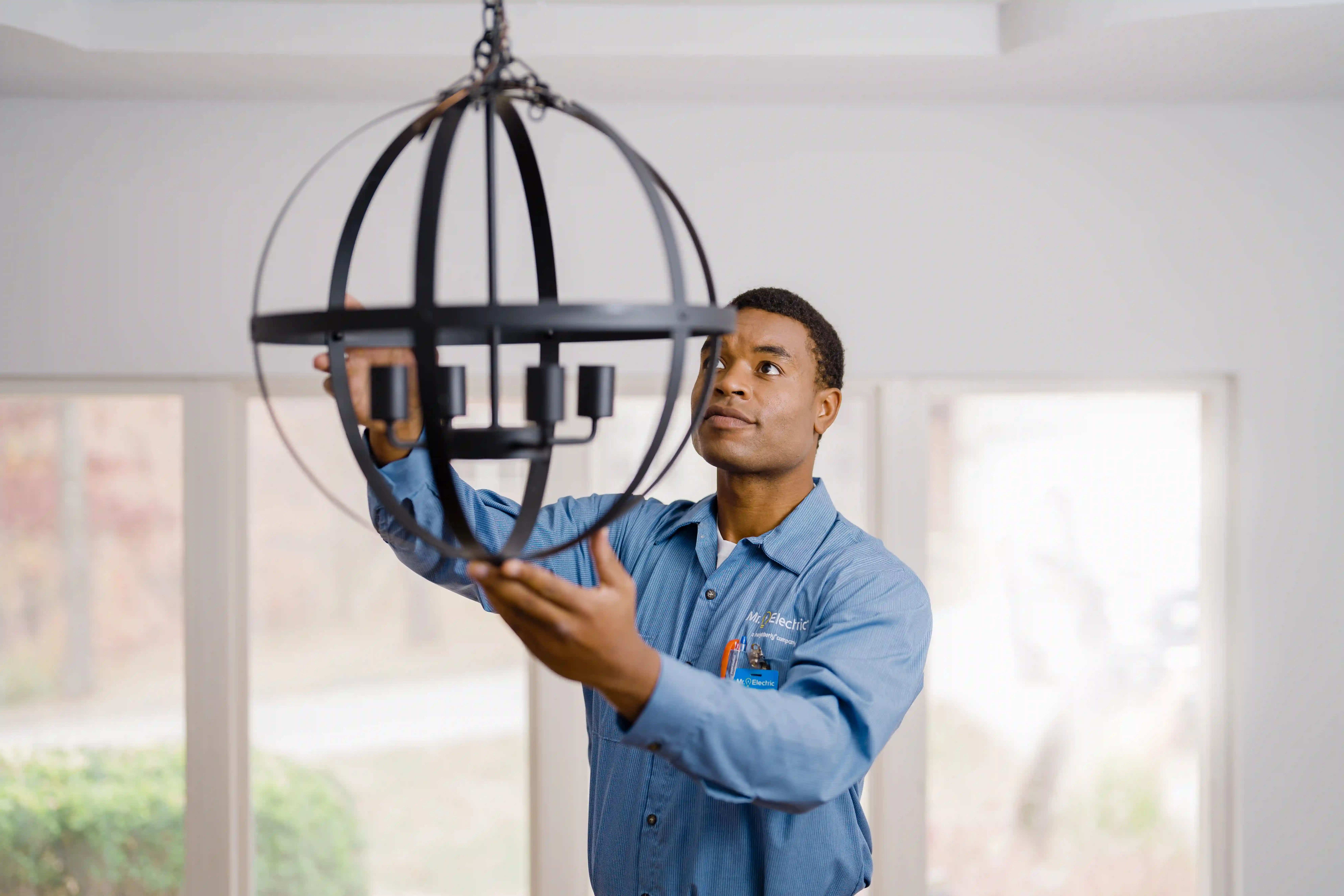 Mr. Electric of Wichita electrician installing specialty lighting.