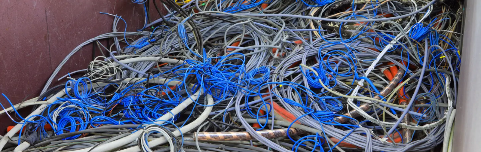 Close-up of a large heap of discarded cables.
